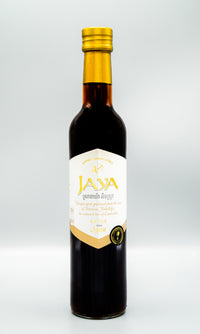 Bottle of Jaya Extra palm spirit with cream label