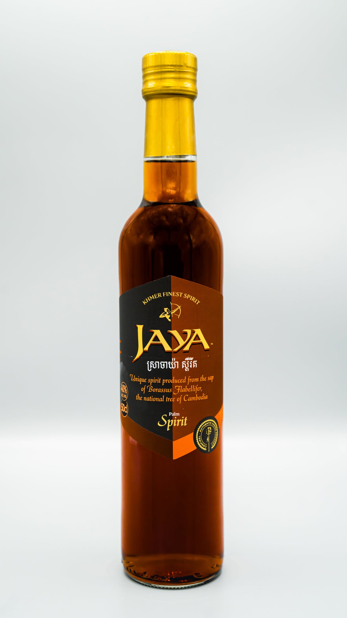 Bottle of Jaya palm spirit with dark orange label