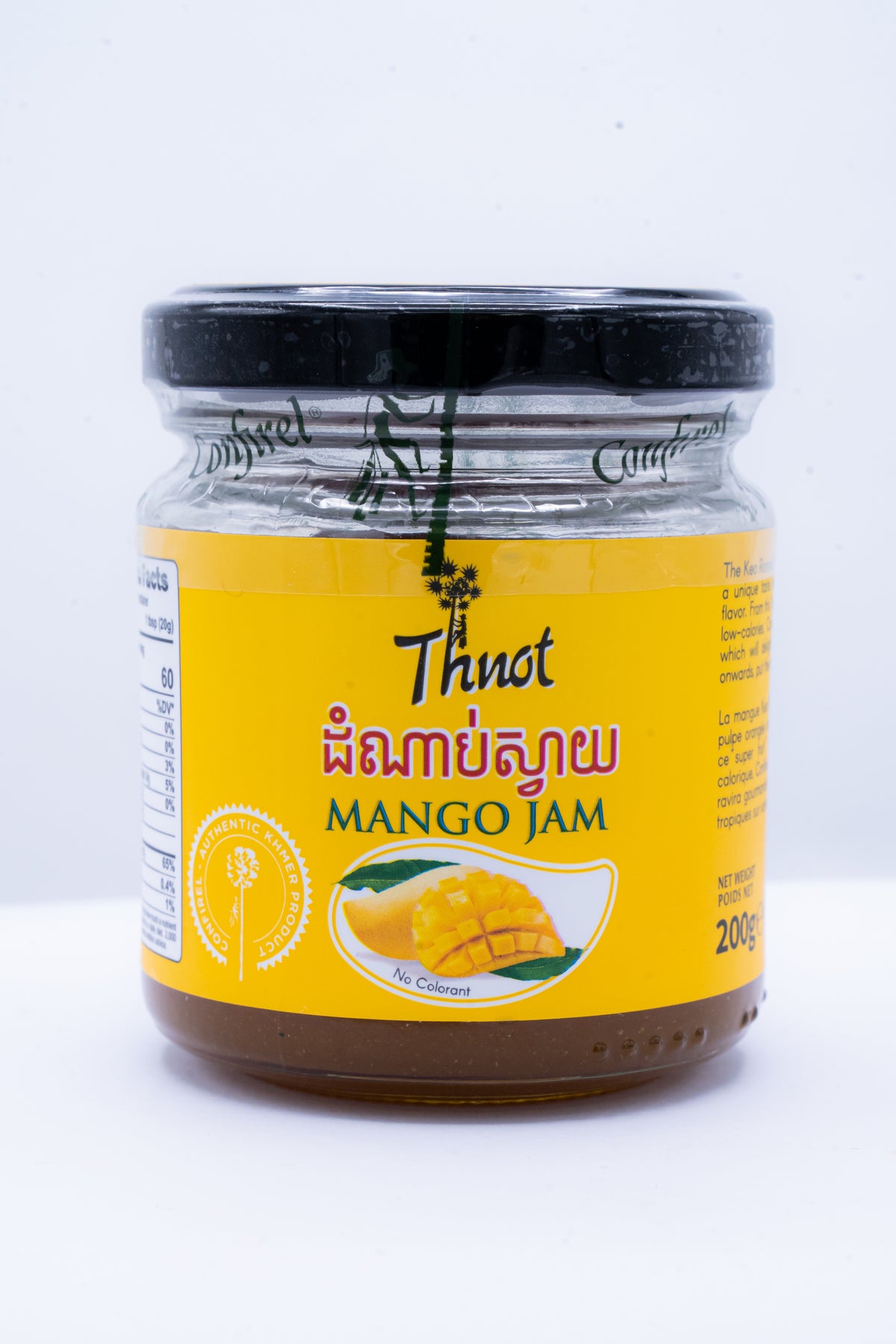 Glass jar of Thnot mango jam, 200g, with Khmer-language label
