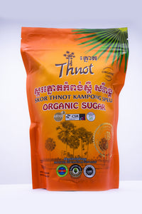 Orange zipper bag of Skor Thnot Kampong Speu organic sugar, 500g