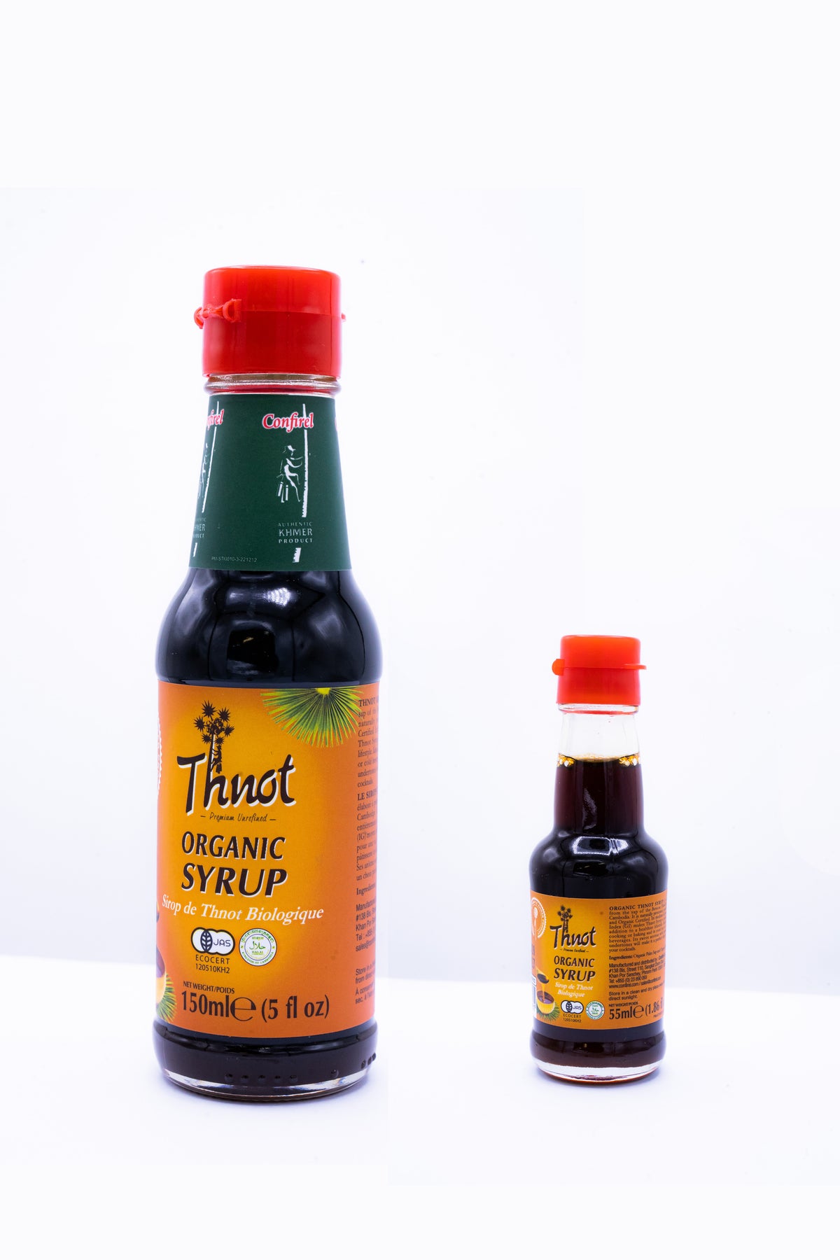 Two bottles of Thnot organic palm syrup, large and small sizes